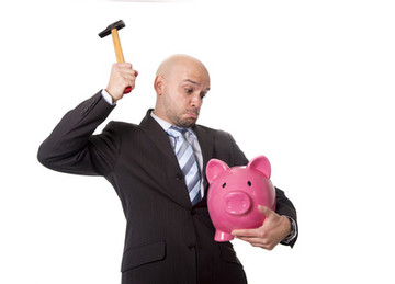 Fotolia_76394032_XSnb Hamer en Spaarvarken en Man